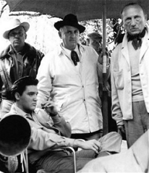 Presley and Parker on the 1958 set of King Creole